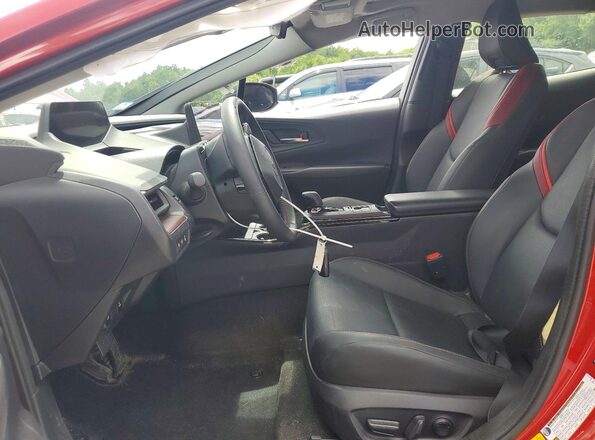 JTDACACUXS3048817 2025 TOYOTA PRIUS Красный Вид салона спереди