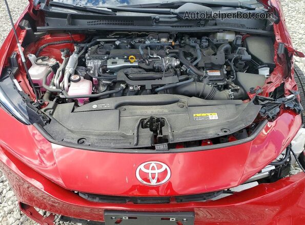 JTDACACUXS3048817 2025 TOYOTA PRIUS Красный Вид задней части салона