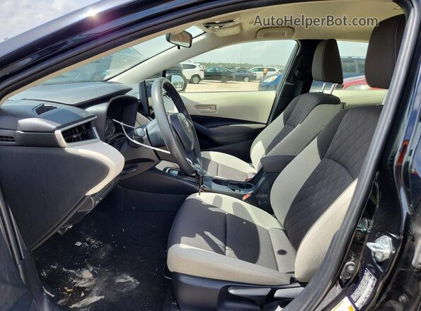 JTDB4MEE3P3009213 2023 TOYOTA COROLLA Black Front interior view