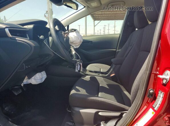 JTDB4MEE3T3042352 2026 TOYOTA COROLLA Red Front interior view