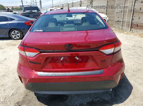 JTDB4MEE3T3042352 2026 TOYOTA COROLLA Red Rear view