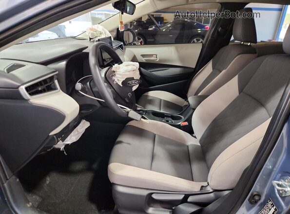 JTDB4MEE5T3045480 2026 TOYOTA COROLLA Gray Widok wnętrza z przodu