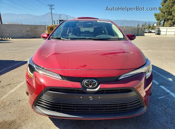 JTDB4MEE6T3034360 2026 TOYOTA COROLLA Red Front view