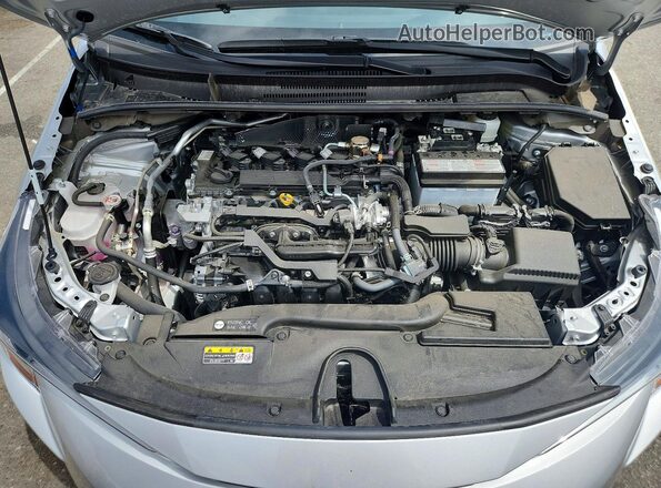 JTDB4MEE7T3038210 2026 TOYOTA COROLLA Серебряный Вид задней части салона