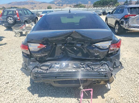 JTDB4MEE7T3040748 2026 TOYOTA COROLLA Gray Rear view
