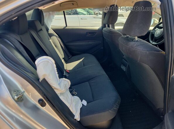 JTDBCMFE0RJ033453 2024 TOYOTA COROLLA Silver Vista de los asientos traseros