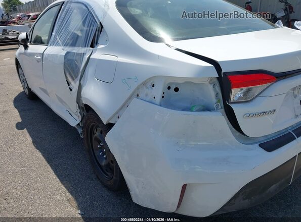 JTDBCMFE0T3139168 2026 TOYOTA COROLLA HYBRID White Вид задньої частини салону