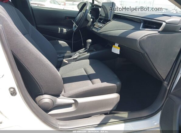 JTDBCMFE0T3139168 2026 TOYOTA COROLLA HYBRID White Вид салону спереду
