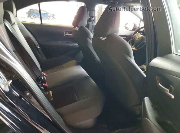 JTDBCMFE1R3037418 2024 TOYOTA COROLLA Black Rear seats view