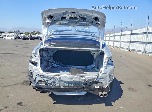 JTDBCMFE2R3029425 2024 TOYOTA COROLLA Серебряный Вид сзади