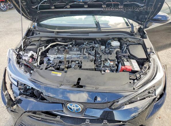 JTDBCMFE2S3108437 2025 TOYOTA COROLLA Black Rear interior view