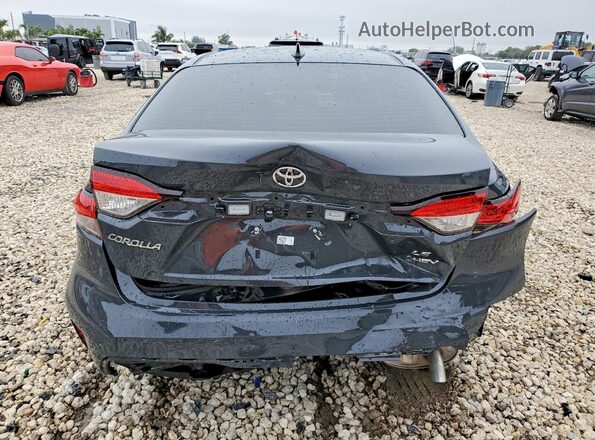 JTDBCMFE3T3128052 2026 TOYOTA COROLLA Серый Вид сзади