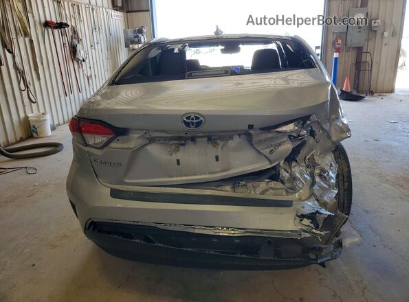 JTDBCMFE4SJ038323 2025 TOYOTA COROLLA Серебряный Вид сзади