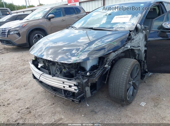 JTDBCMFE4T3141134 2026 TOYOTA COROLLA HYBRID Черный Вид спереди