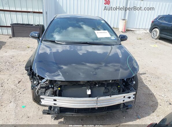 JTDBCMFE4T3141134 2026 TOYOTA COROLLA HYBRID Черный Вид задней части салона