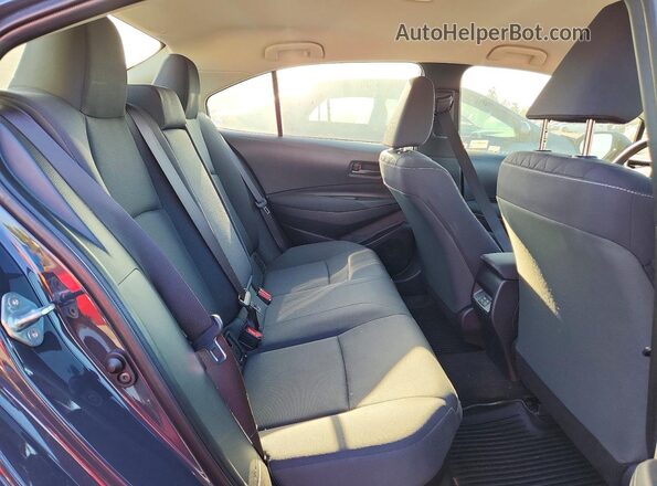 JTDBCMFE5S3110327 2025 TOYOTA COROLLA Gray Vista de los asientos traseros