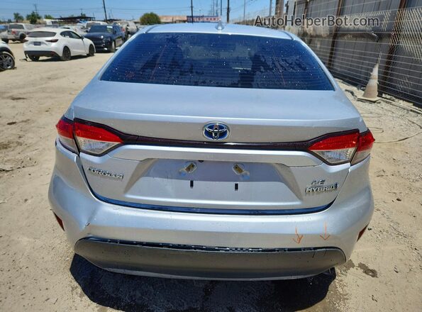 JTDBCMFE6P3008011 2023 TOYOTA COROLLA Silver Rear view