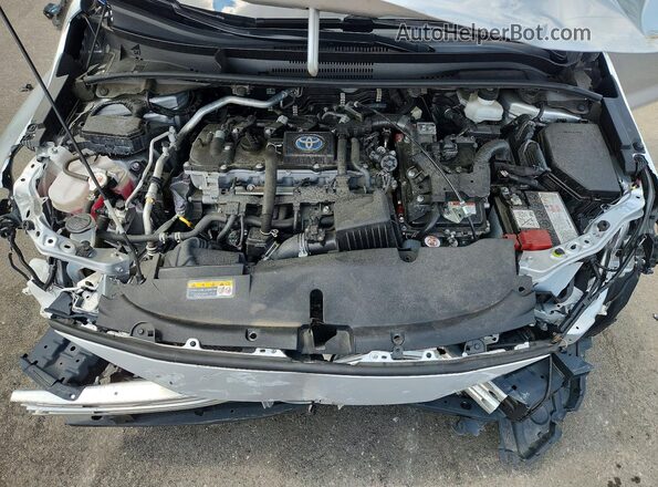 JTDBCMFE6R3051976 2024 TOYOTA COROLLA Серебряный Вид задней части салона