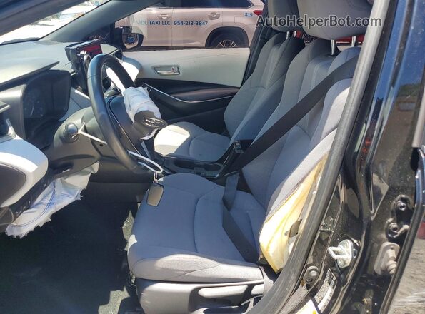 JTDBCMFE7R3048178 2024 TOYOTA COROLLA Black Front interior view