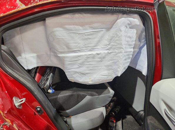 JTDBCMFE7RJ035541 2024 TOYOTA COROLLA Red Rear seats view