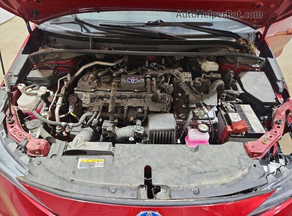 JTDBCMFE7RJ035541 2024 TOYOTA COROLLA Red Rear interior view