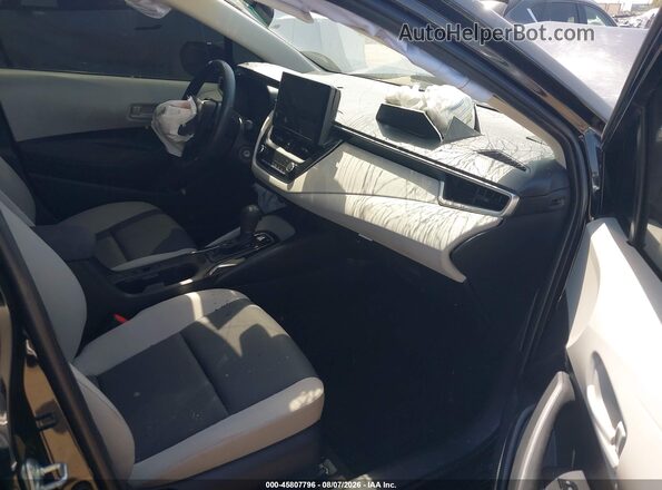 JTDBCMFE7S3108594 2025 TOYOTA COROLLA Black Front interior view