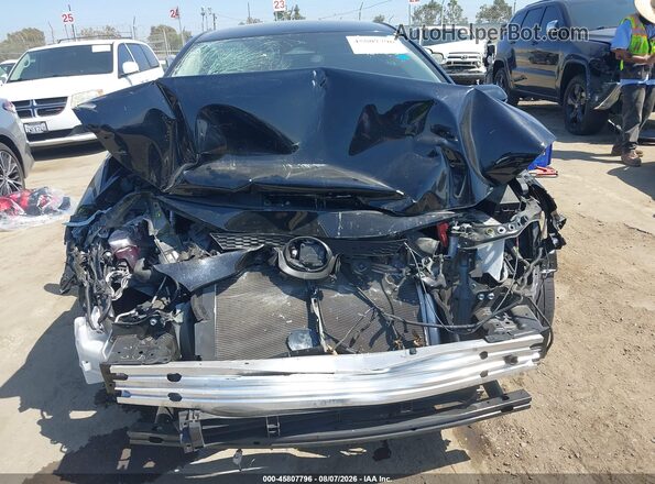 JTDBCMFE7S3108594 2025 TOYOTA COROLLA Black Front view
