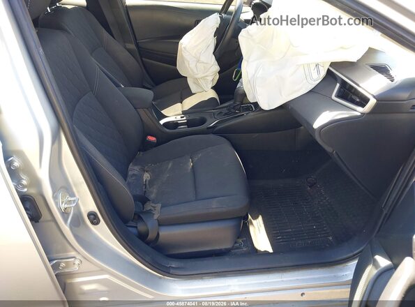 JTDBCMFE7SJ044956 2025 TOYOTA COROLLA Silver Widok wnętrza z przodu