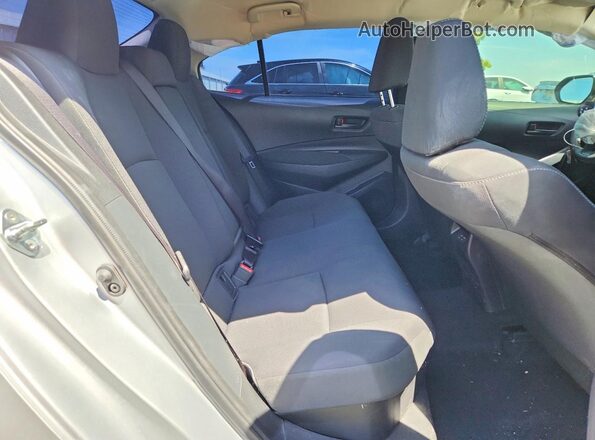 JTDBCMFE7T3114235 2026 TOYOTA COROLLA Silver Rear seats view