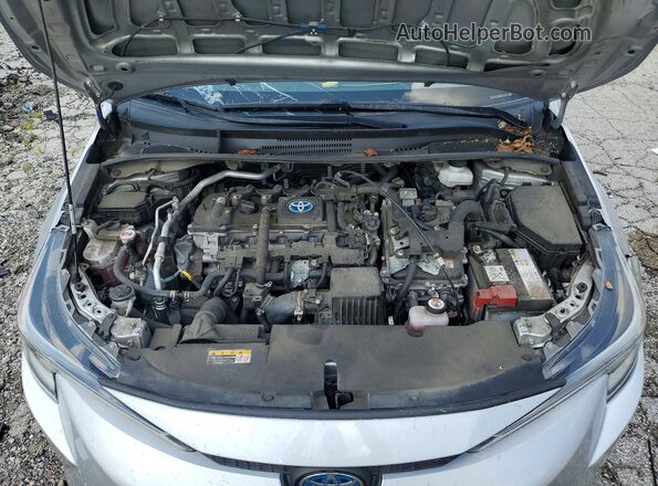 JTDBCMFE8PJ000634 2023 TOYOTA COROLLA Silver Vista interior trasera