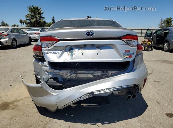 JTDBCMFE8R3058282 2024 TOYOTA COROLLA Серебряный Вид сзади