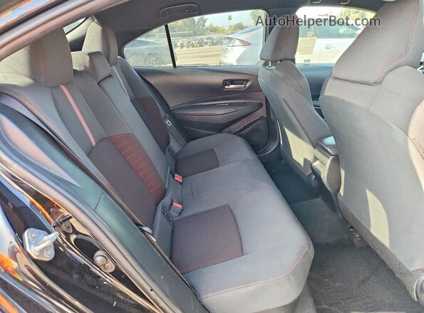 JTDBCMFE9R3033231 2024 TOYOTA COROLLA Black Rear seats view