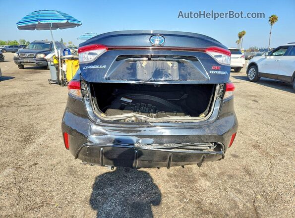 JTDBCMFE9R3033231 2024 TOYOTA COROLLA Black Rear view