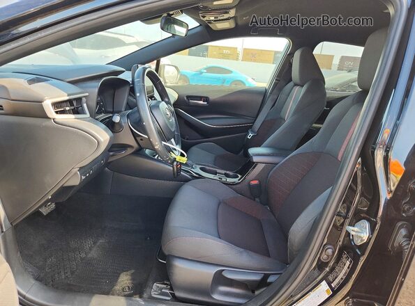 JTDBCMFE9R3033231 2024 TOYOTA COROLLA Black Front interior view