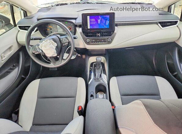JTDBCMFE9R3059649 2024 TOYOTA COROLLA Белый Вид панели приборов
