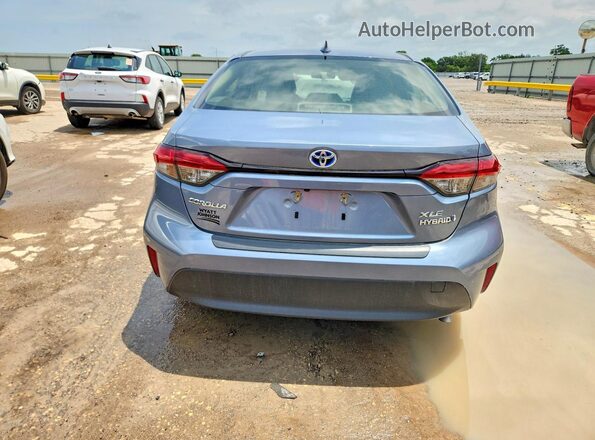 JTDBCMFE9RJ023536 2024 TOYOTA COROLLA Синий Вид сзади