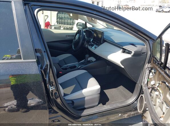 JTDBCMFEXPJ010906 2023 TOYOTA COROLLA Черный Вид салона спереди