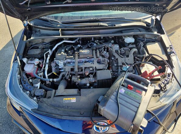 JTDBCMFEXRJ021245 2024 TOYOTA COROLLA Blue Vista interior trasera