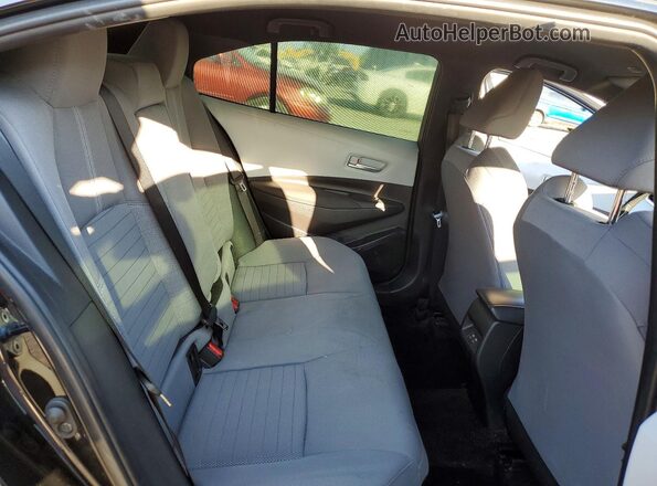 JTDBDMHE8P3000633 2023 TOYOTA COROLLA Red Rear seats view