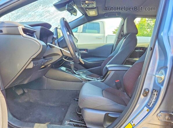 JTDBDMHE9P3002469 2023 TOYOTA COROLLA Silver წინა სალონის ხედი
