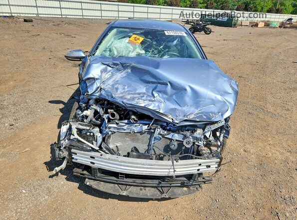 JTDEAMDE2NJ037410 2022 TOYOTA COROLLA Teal Front view