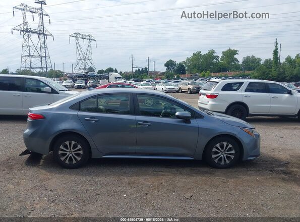 JTDEAMDE3NJ043832 2022 TOYOTA COROLLA Turquoise Vista interior trasera