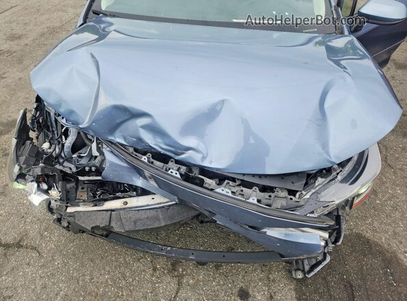 JTDEPMAE6N3018379 2022 TOYOTA COROLLA Blue Սալոնի հետևի տեսք