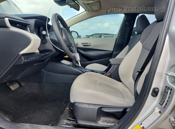 JTDEPMAE9NJ202324 2022 TOYOTA COROLLA Серебряный Вид салона спереди