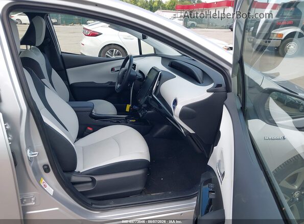 JTDKAMFU4M3134568 2021 TOYOTA PRIUS Silver Vista interior delantera
