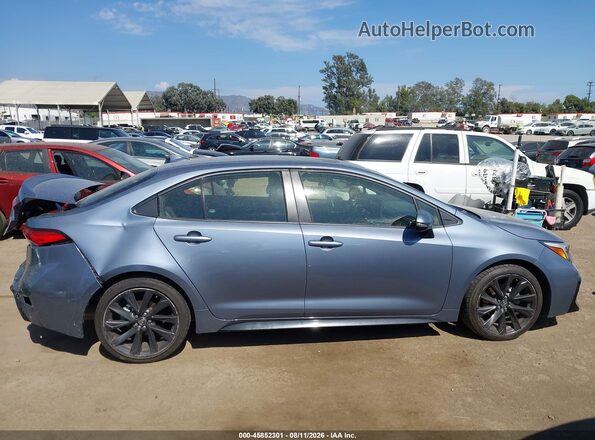 JTDP4MCE3PJ102446 2023 TOYOTA COROLLA Light Blue Вид задней части салона