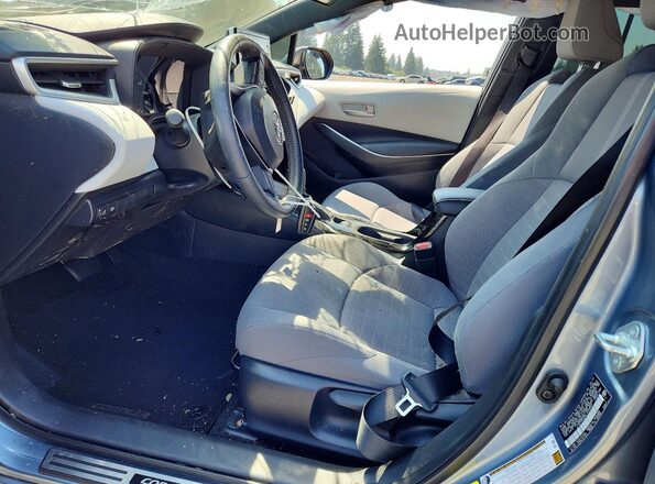 JTDP4RCE8LJ004892 2020 TOYOTA COROLLA Silver Front interior view