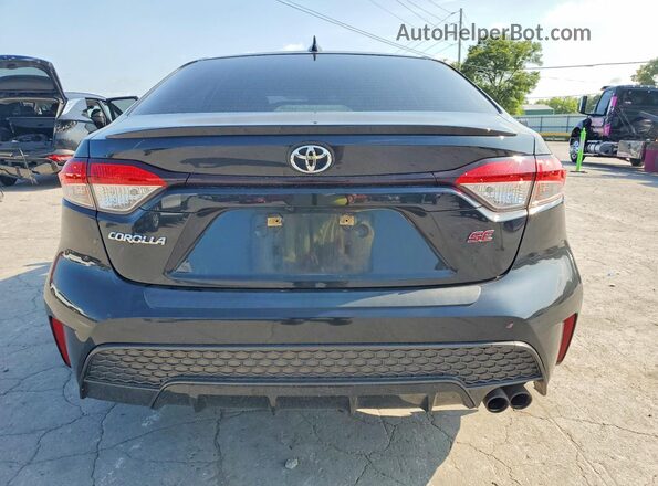 JTDS4MCE6NJ085228 2022 TOYOTA COROLLA Black Rear view