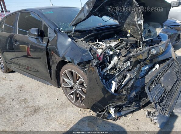 JTDS4MCE7NJ092527 2022 TOYOTA COROLLA Black Widok wnętrza z tyłu