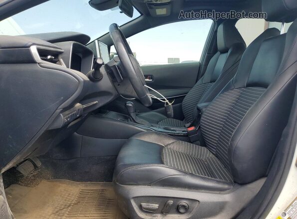JTDT4RCE5LJ041574 2020 TOYOTA COROLLA Белый Вид салона спереди